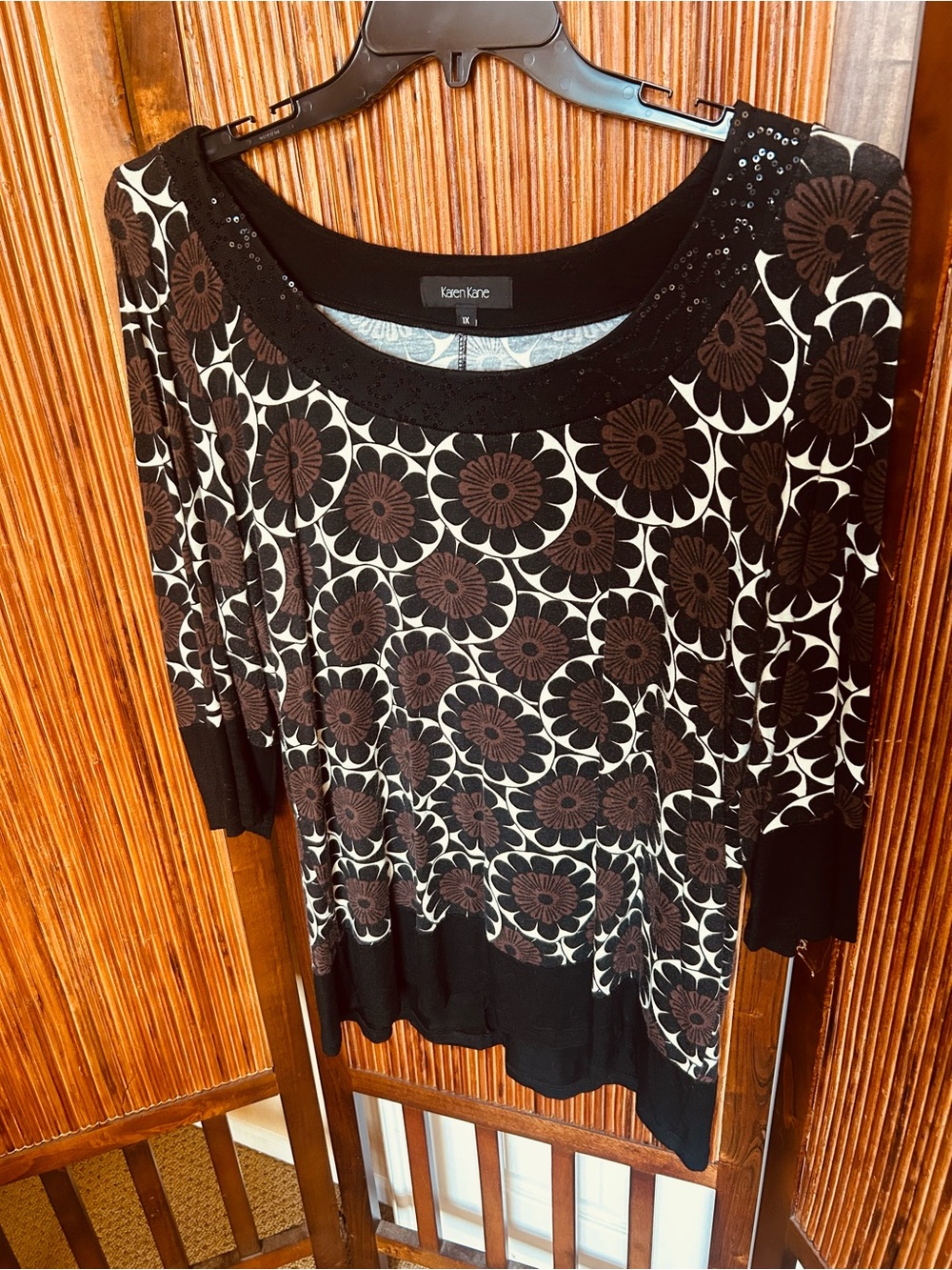 Karen Kane Black and Brown Floral Scoop Neck Tunic, with subtle sequin accents.